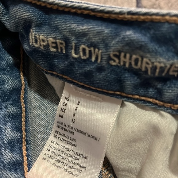 Stylish Women's Denim Shorts - White, Black, and Light Blue - Picture 3 of 7